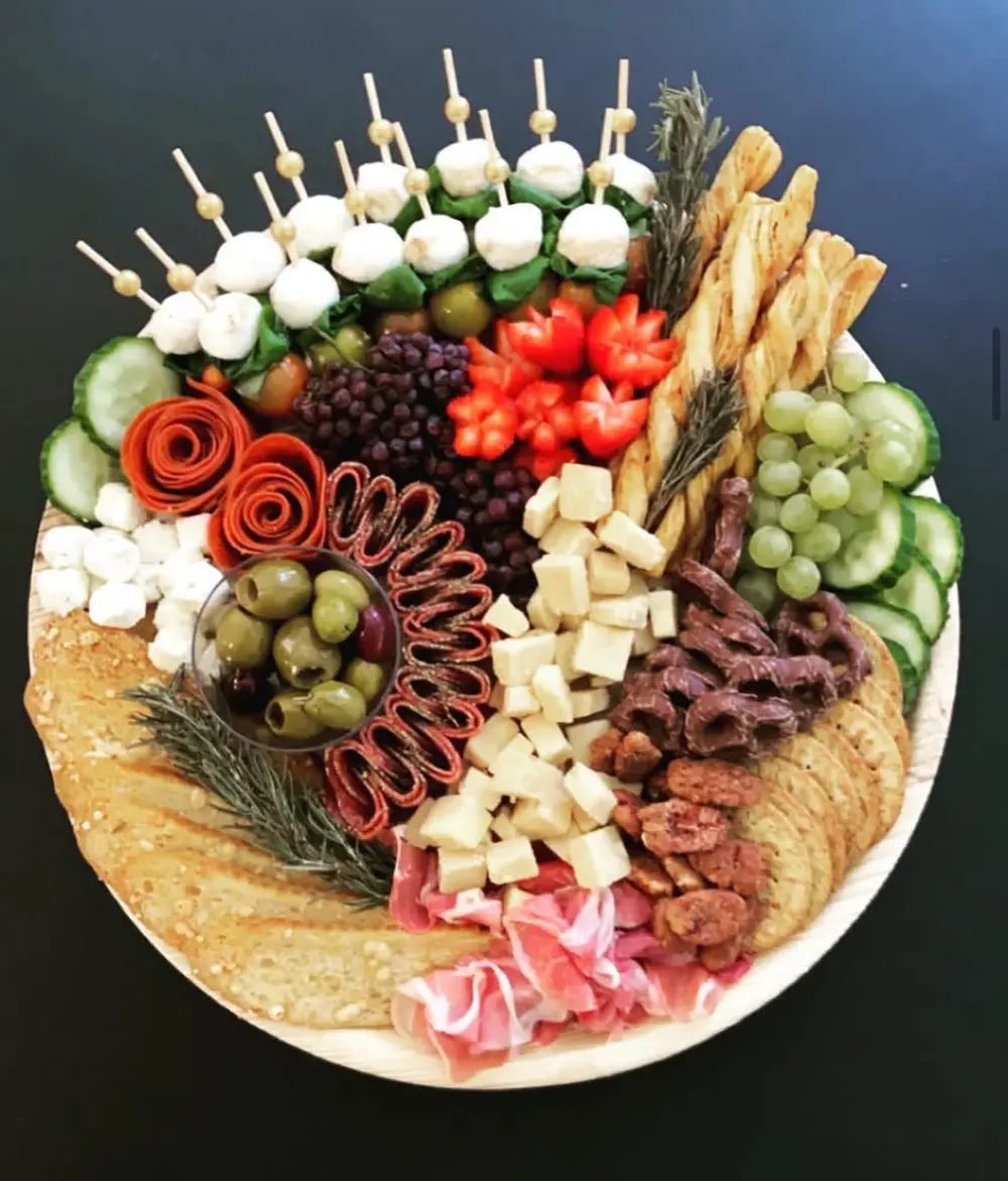 Circle shaped charcuterie board with swirling design